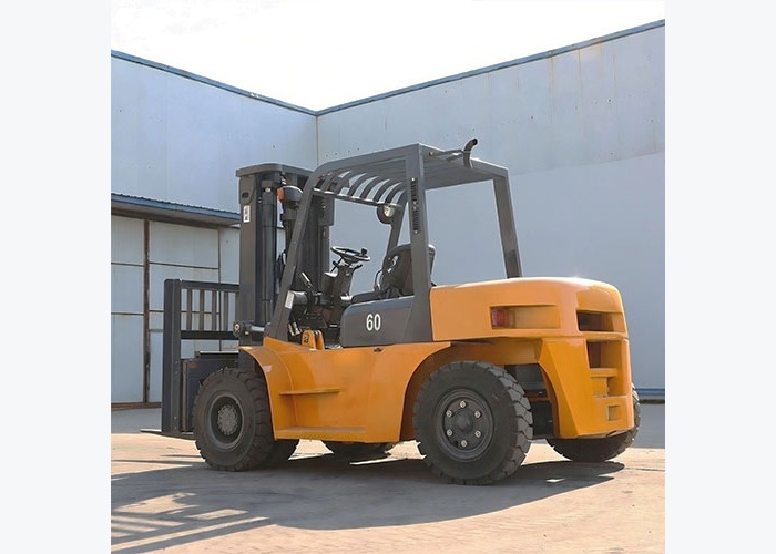 Diesel forklift staged on a yard route where ramp traction and load control matter