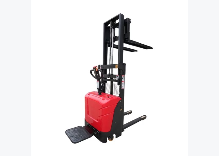 Walkie stacker lifting a pallet in a narrow warehouse aisle