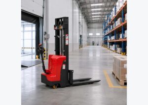 Pallet stacker positioned for compact warehouse pallet handling