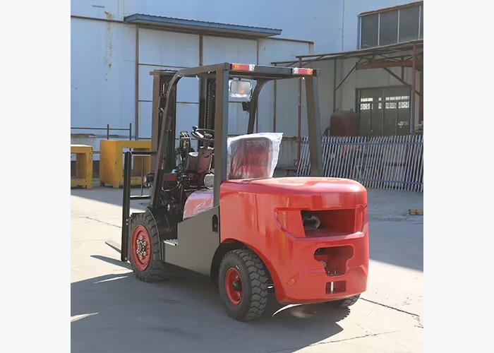 Operator checking diesel forklift forks, tires, and mast components before loading