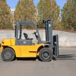 Diesel forklift positioned before a ramp route for slope and dock-plate safety review
