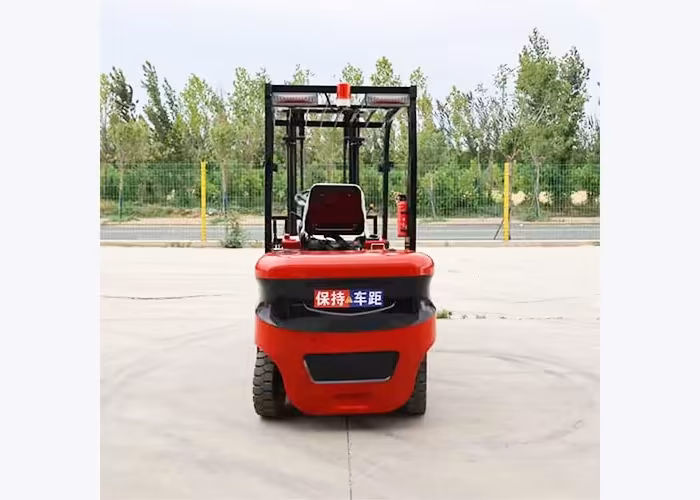Operator checking hose position and ignition clearance while refueling a diesel forklift