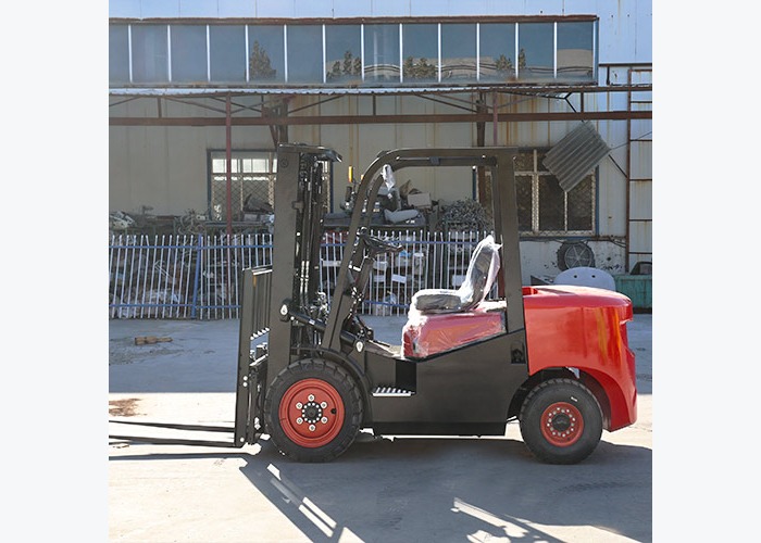 Diesel forklift positioned for load alignment and rack approach work