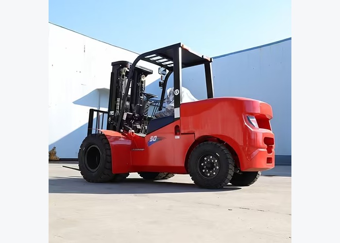 Heavy diesel forklift staged for attachment review and outdoor daily handling