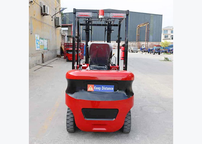 Electric forklift staged for night-shift route and pedestrian awareness review