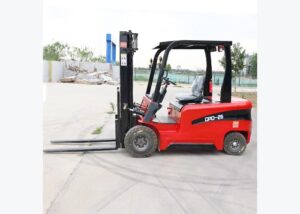 Electric forklift parked for troubleshooting slow travel and weak lift symptoms