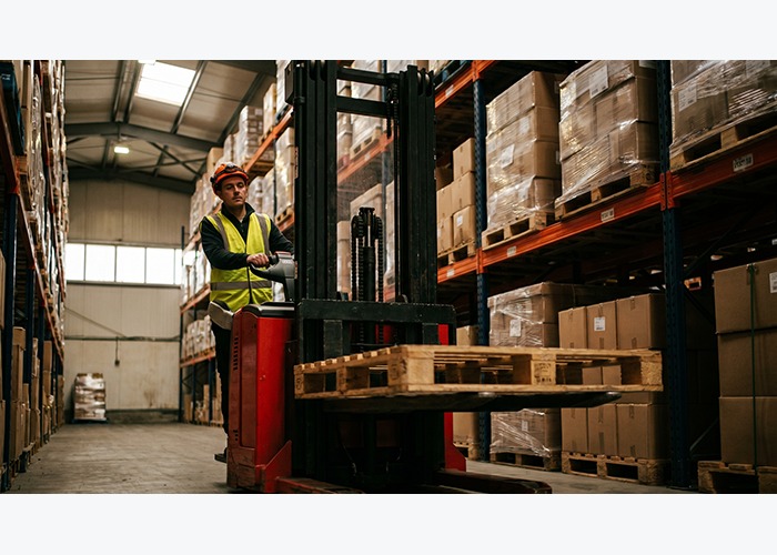 Warehouse pallet stacker prepared for battery brake and service schedule checks