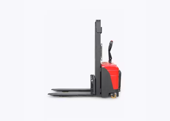 Electric stacker moving a pallet in a warehouse aisle with controlled travel space