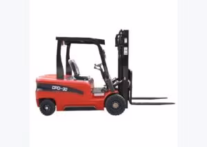 Electric forklift staged near a charger with the shift board visible for uptime planning