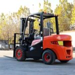 Used diesel forklift parked for pre-purchase inspection in an outdoor equipment yard