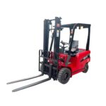 Walkie stacker approaching a warehouse ramp with clear floor markings and pallet alignment