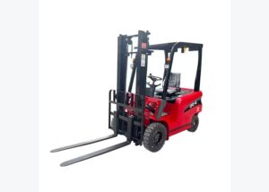 Walkie stacker approaching a warehouse ramp with clear floor markings and pallet alignment